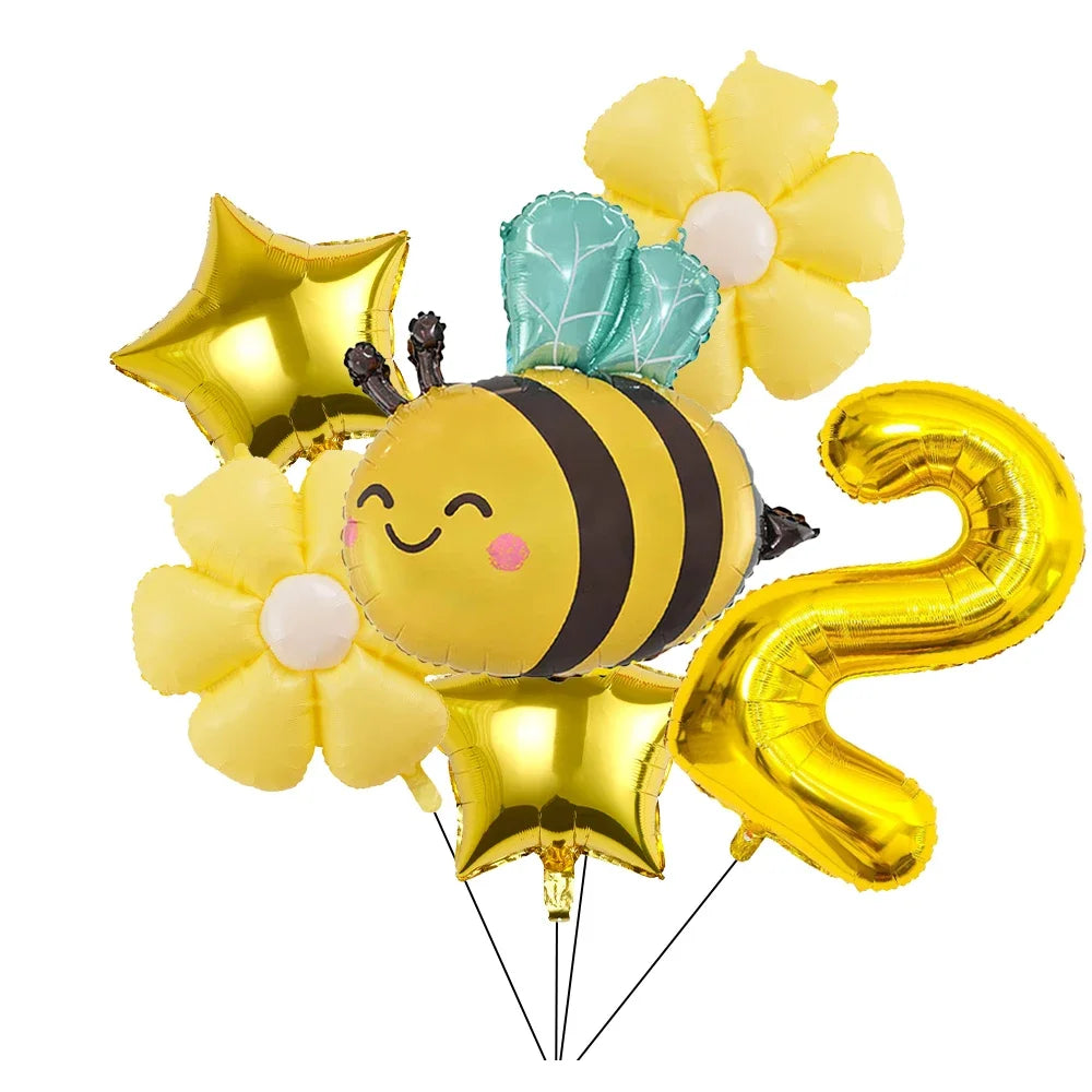 A set of six yellow and gold aluminum foil daisy balloons shaped like bees and flowers for parties