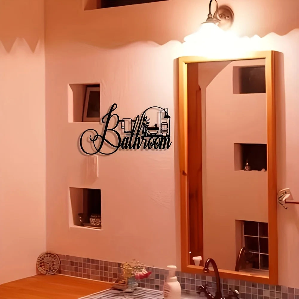 Elegant iron bathroom sign wall art with a vintage style metal plaque mounted on a white wall.