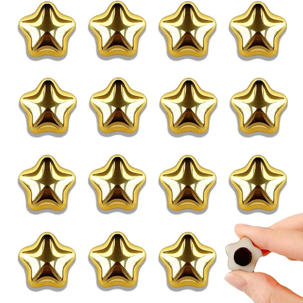 A collection of fifteen gold star-shaped fridge magnets arranged in a grid.