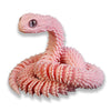 A pink, textured snake art model with a head and body, shown in a close-up view.