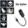 A projector displaying six spooky styles including a spider, skull, ghost, monster, hand, and bat.