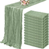 A set of ten terracotta semi-sheer cheesecloth table runners in a muted sage green color.