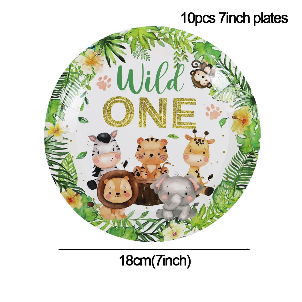 A plate featuring a Wild One theme with various jungle safari animals like a cow, tiger, giraffe, and elephant.