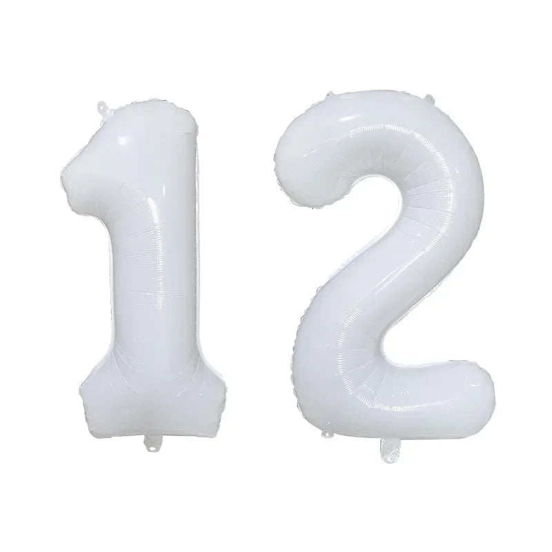 White helium foil number balloons shaped like the numbers 1 and 2