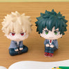 Two chibi collectible figures of My Hero Academia characters, one blonde and one green-haired.