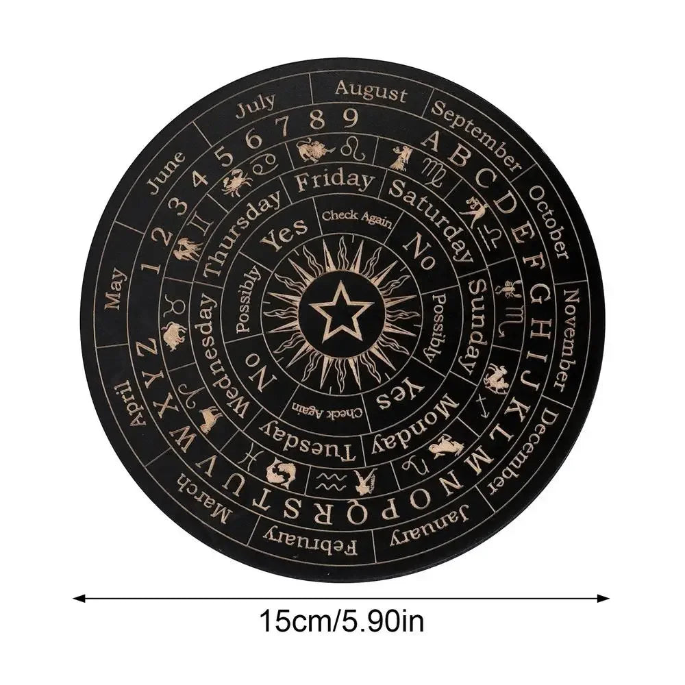 A circular wooden pendulum board with zodiac signs and months marked for divination and meditation