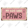 A rustic wooden plaque with pink background and dark text that reads My Kids Have Paws