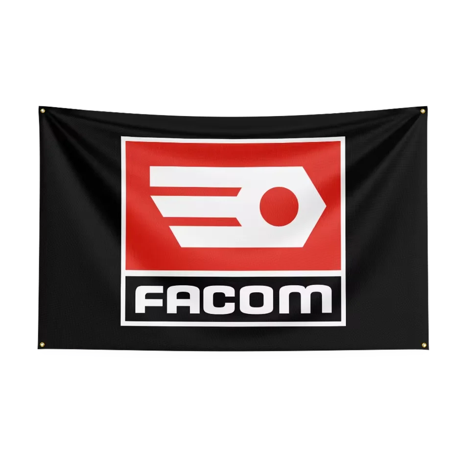 A black flag featuring a red and white logo design with the text FACOM.