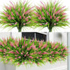 Two bunches of artificial pink and green lavender flowers used for decoration