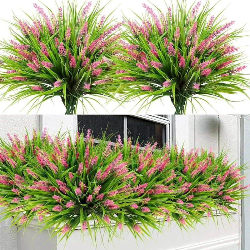 Two bunches of artificial pink and green lavender flowers used for decoration