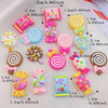 A collection of 20 colorful resin candy charms in various shapes and colors for scrapbooking and jewelry making