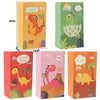 A set of colorful dinosaur-themed disposable party tableware including cups, plates, and a banner.