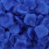 A close-up view of deep blue artificial rose petals used for wedding decoration.