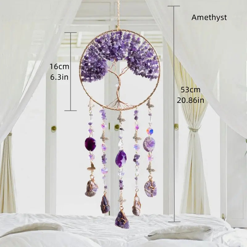 A crystal tree of life sun catcher wall decor featuring a purple amethyst sphere and hanging crystals.