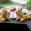 A set of multi-figure dog ornaments, including a golden retriever and a Japanese Spitz, with colorful balloons in the backgro