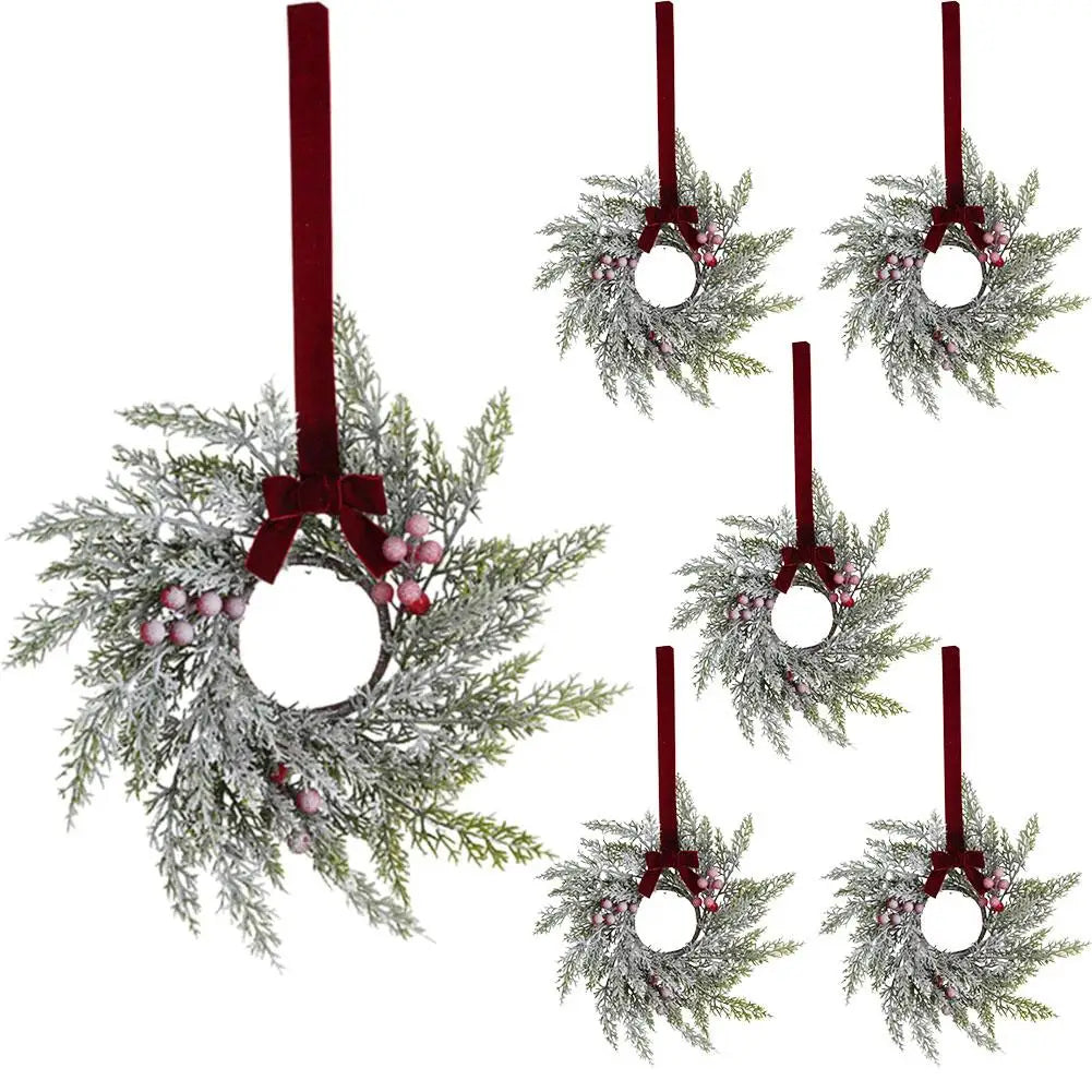 A set of ten-inch artificial Christmas wreaths with red berries and velvet bows on a green fir wreath.