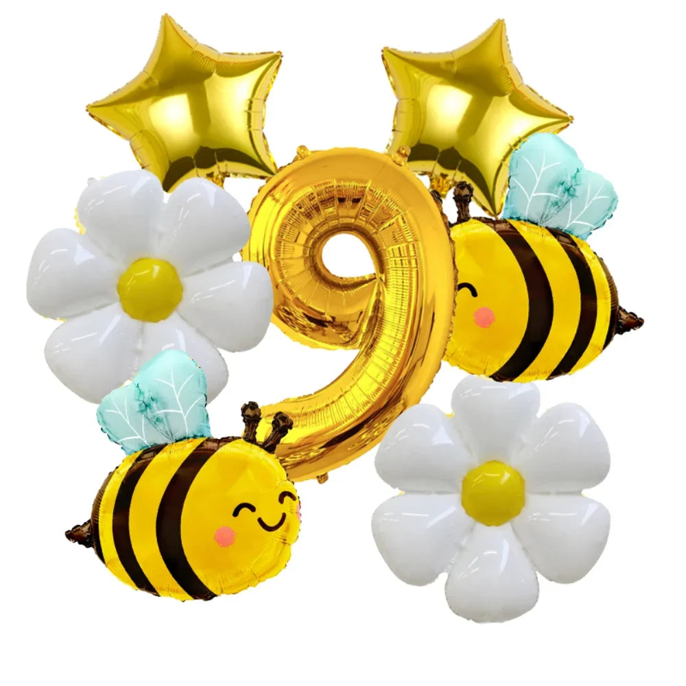 A set of six aluminum foil daisy balloons, including a number nine and bee shapes, for parties.