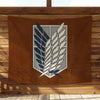 A brown leather banner displaying a silver and blue crest featuring a stylized feather design.