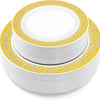 A stack of white plastic dinner and dessert plates with an elegant gold rim.