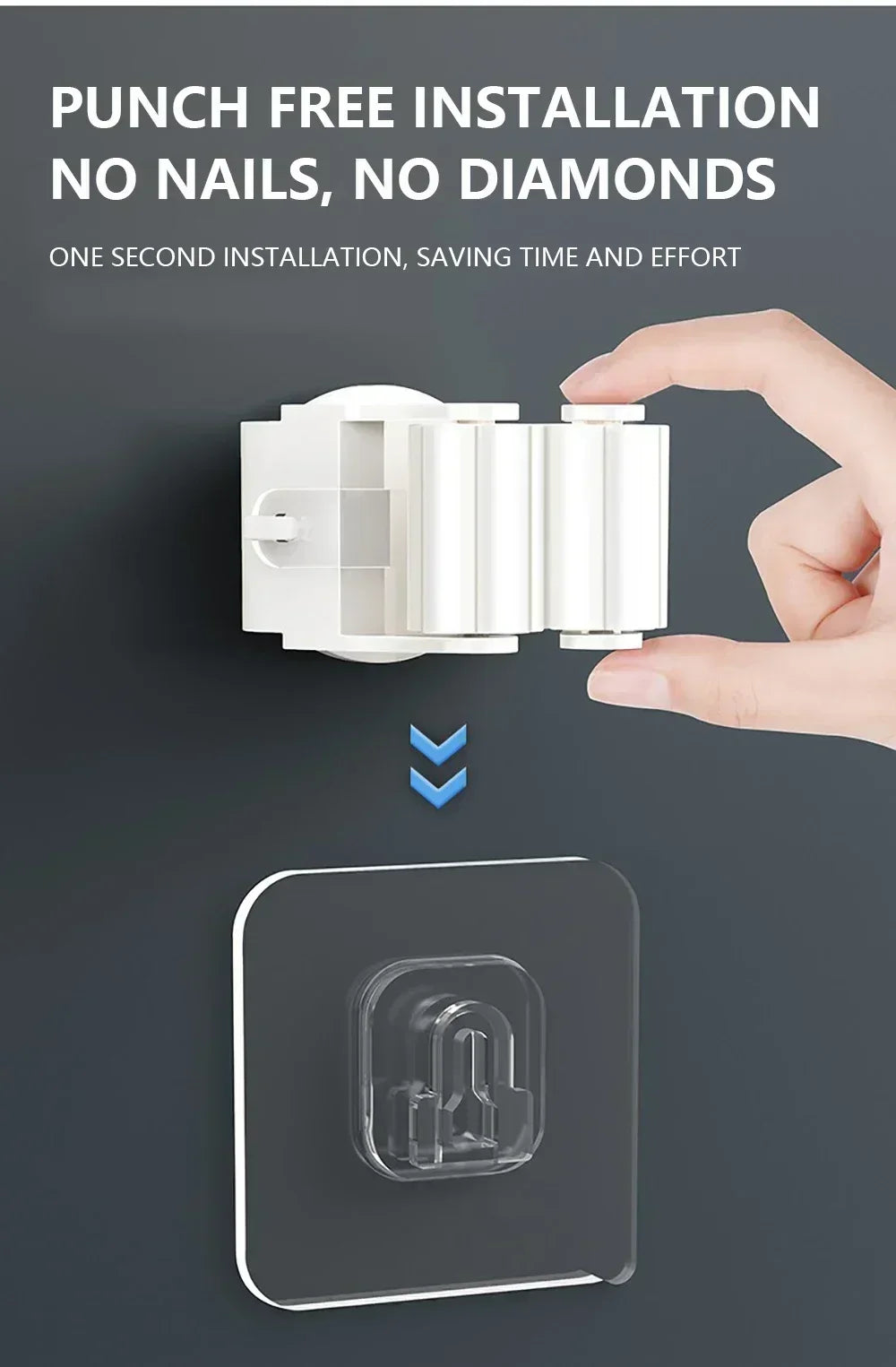 A hand is installing a wall-mounted mop and broom holder onto a dark surface.