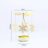 Gold rotating candle holder with a spinning carousel design featuring decorative gold snowflakes.
