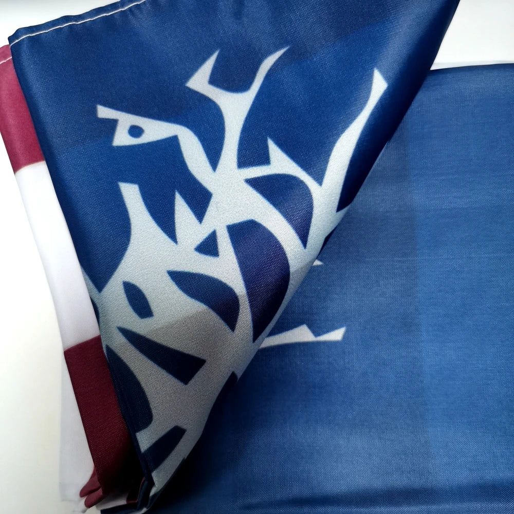 A dark blue fabric banner featuring a white, stylized tree design on the left side.
