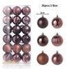 A box containing 36 festive Christmas tree ornament balls in various shades of rose gold and bronze.
