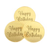 A set of ten round gold acrylic birthday message toppers with the text Happy Birthday