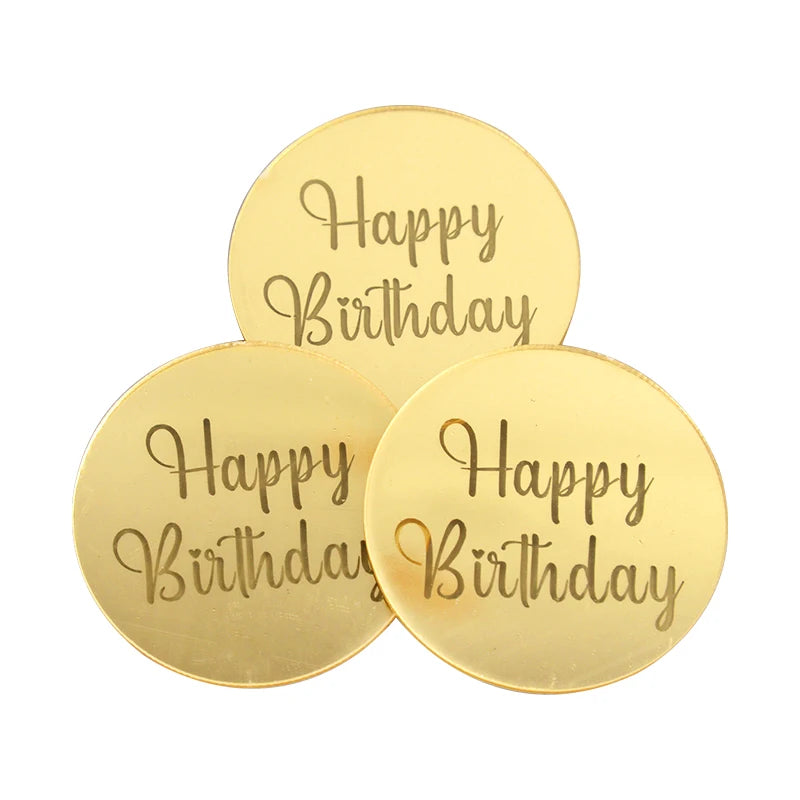 A set of ten round gold acrylic birthday message toppers with the text Happy Birthday