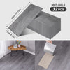 A package of 32 wood grain peel-and-stick floor and wall stickers, showing the texture and dimensions.