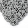 A dense arrangement of gray artificial foam rose decorations forming a heart shape.