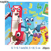 A set of colorful building blocks shaped like characters for a birthday party decoration.