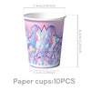 A purple and pink paper cup featuring a sparkly silhouette design for a happy birthday party.