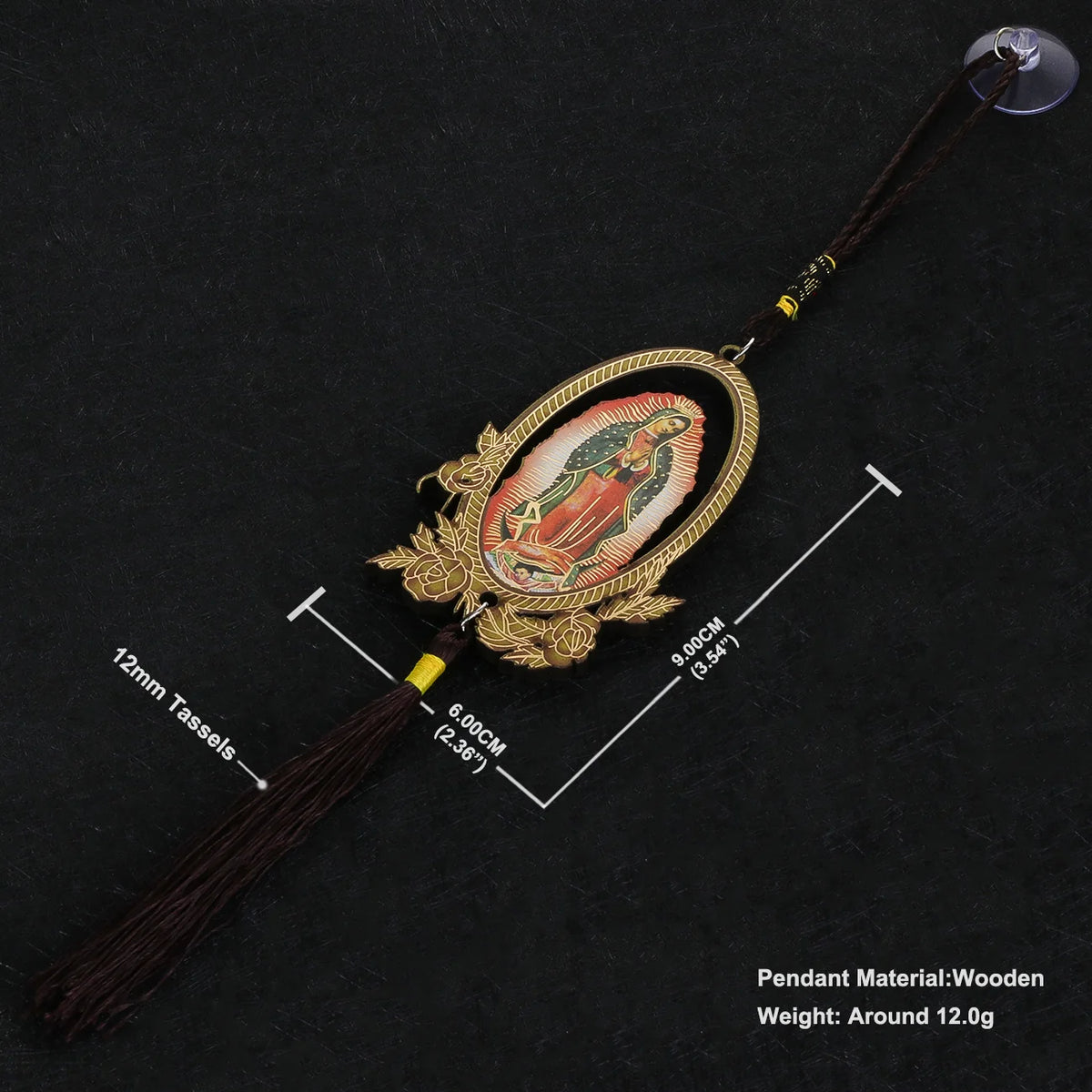 A wooden Our Lady of Guadalupe pendant with a gold frame and dark brown tassel.