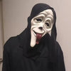 A white screaming skeleton horror mask with black draping and a purple tongue is shown.