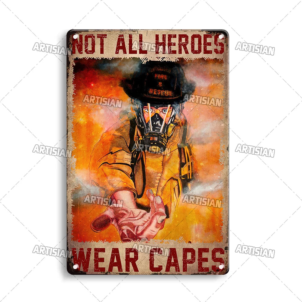 Vintage metal sign featuring a firefighter wearing a helmet and gear with the text NOT ALL HEROES WEAR CAPES