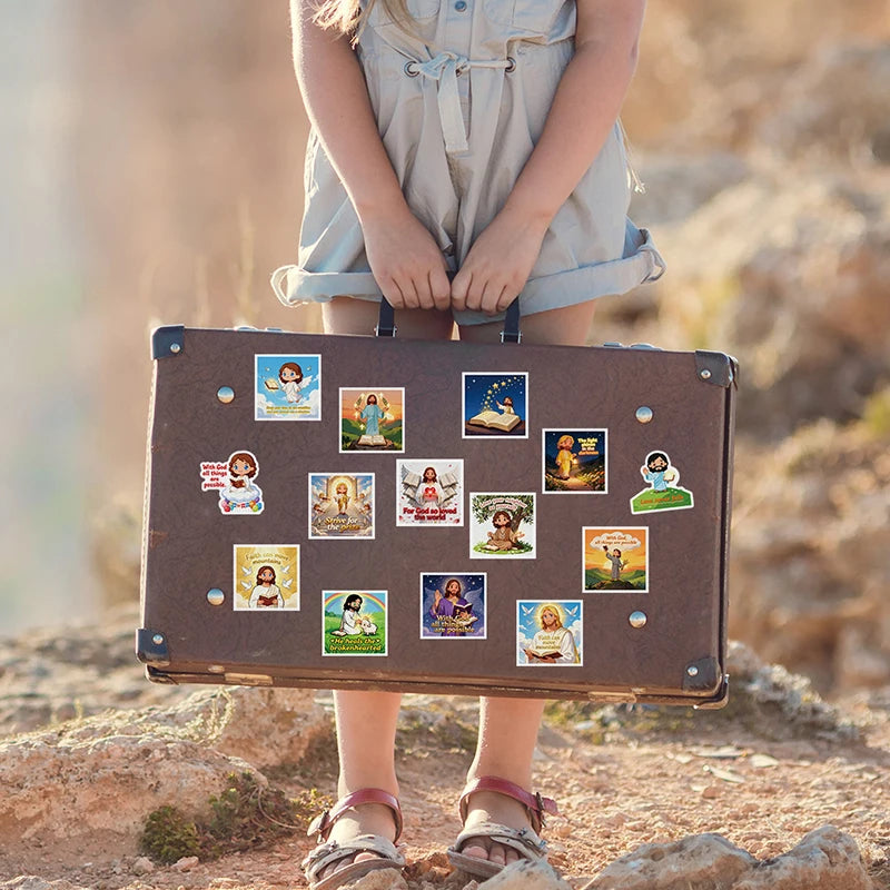 A young girl holds a brown suitcase decorated with Christian faith stickers for journaling and gifting in a dry outdoor setti