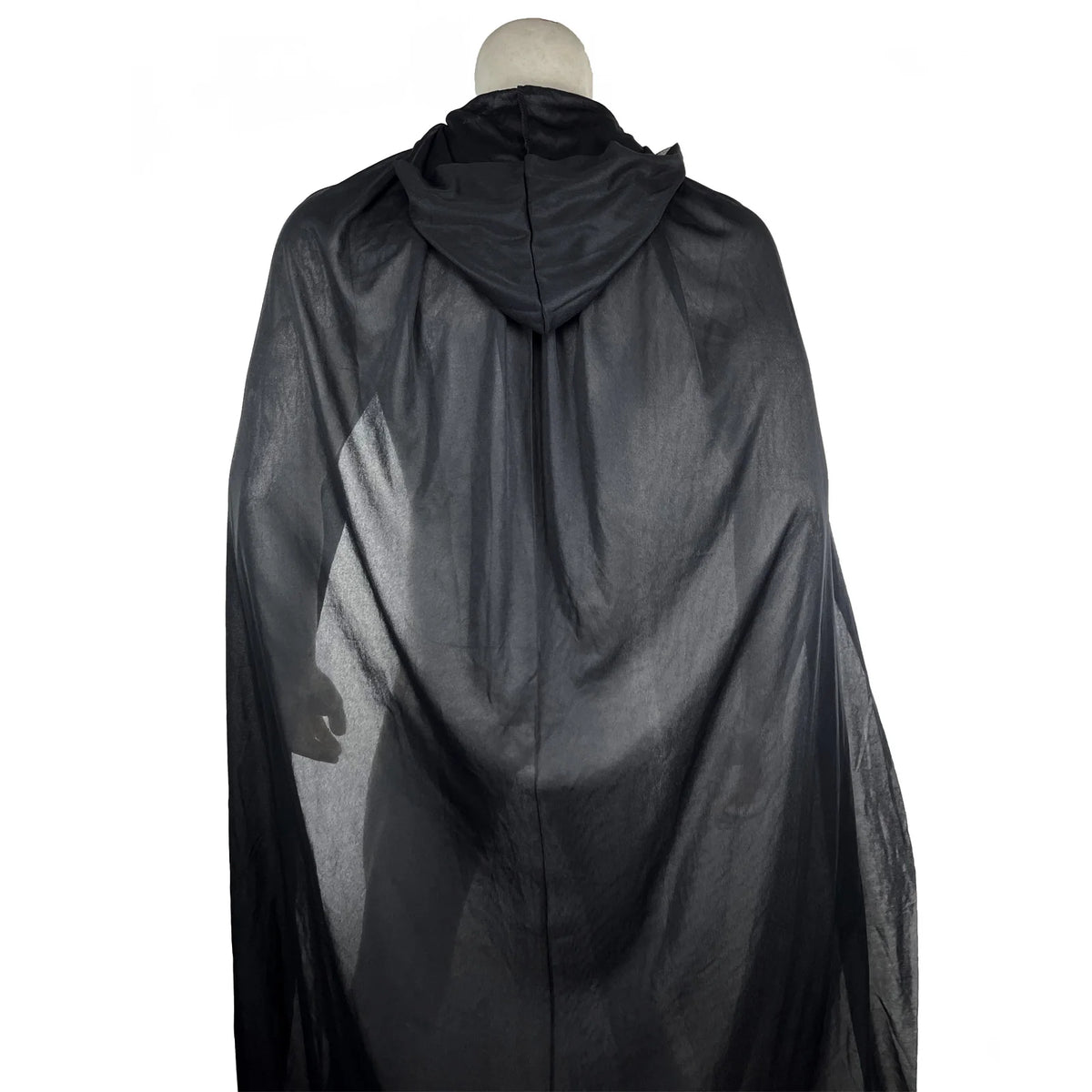 A black hooded cape draped over a mannequin.