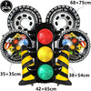 A set of black and yellow race car number balloons, including a 7-piece balloon and various sized balloons for party decorati