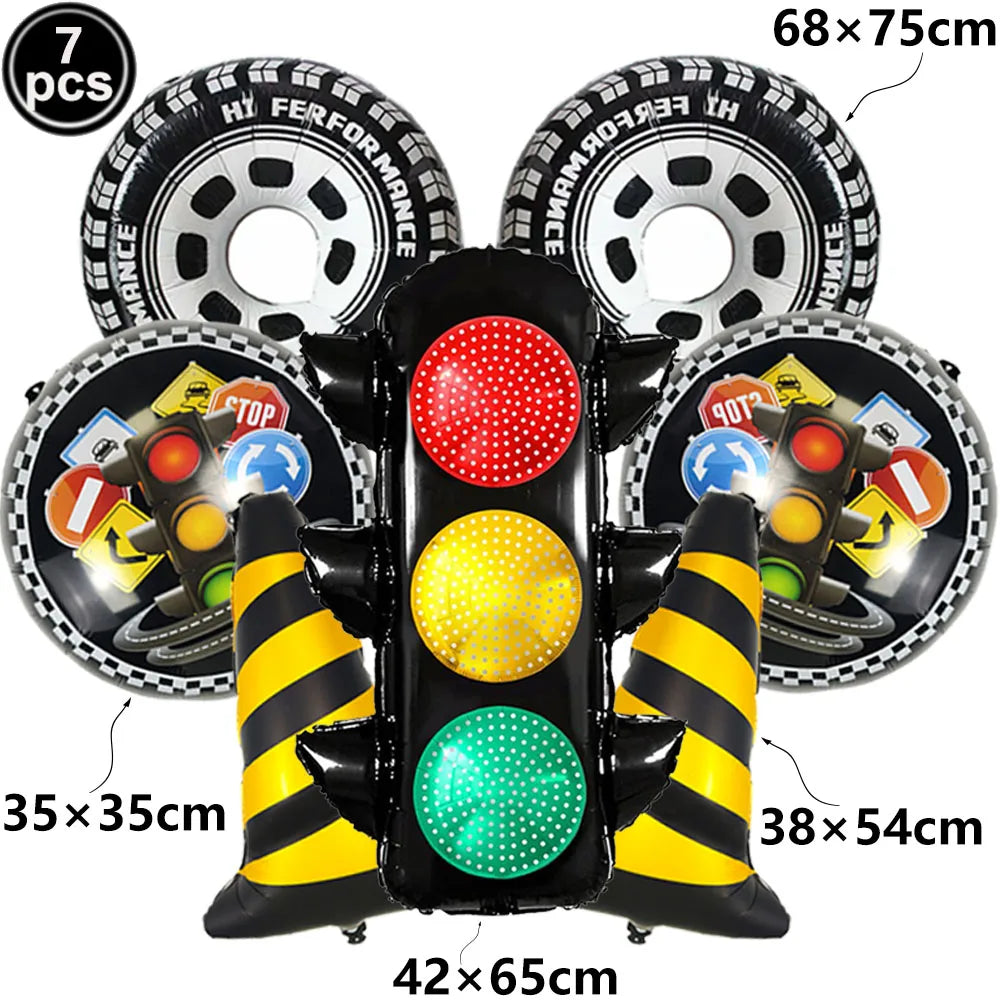 A set of black and yellow race car number balloons, including a 7-piece balloon and various sized balloons for party decorati