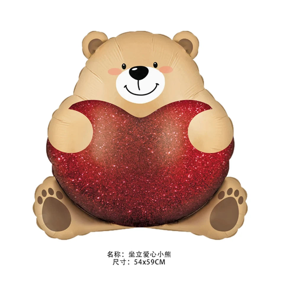 A cute bear-shaped balloon with a red heart design and foil finish.