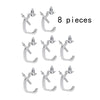 Eight pieces of silver aluminum C-clamp hooks used for stage lighting trusses.