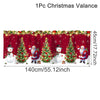 Festive Christmas valance featuring Santa figures and decorated Christmas trees on a red backdrop
