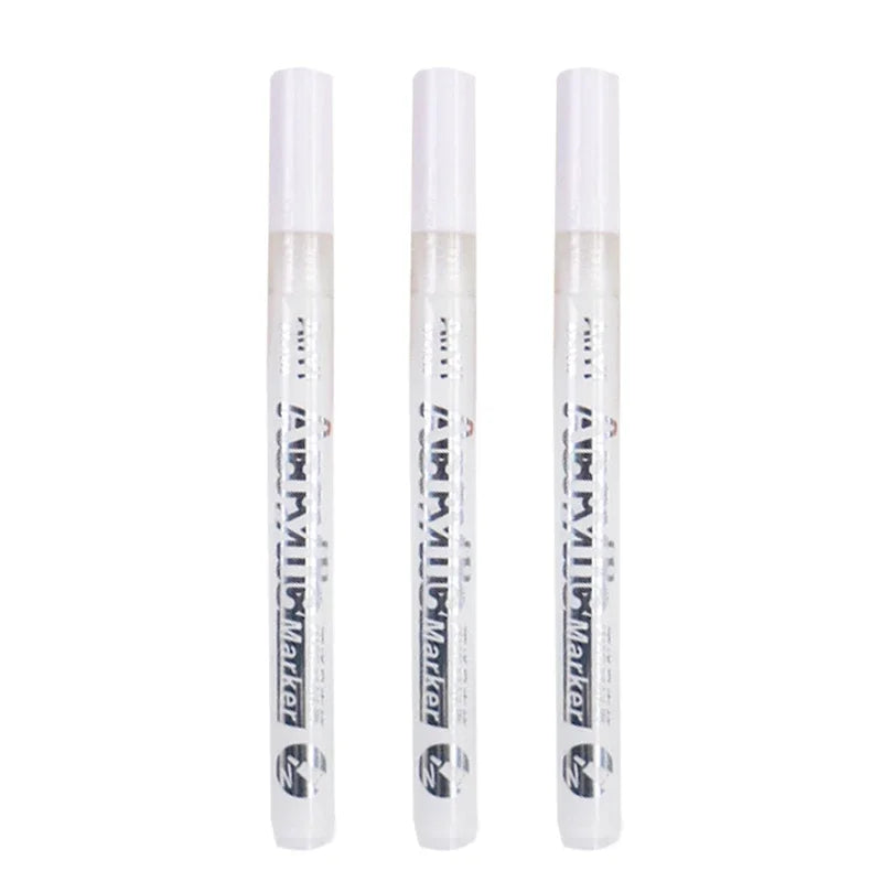 Three extra-fine point acrylic paint pens for multi-surface art displayed vertically.