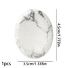 Oval natural white marble bead with gray veining, measuring 4.5 cm long.