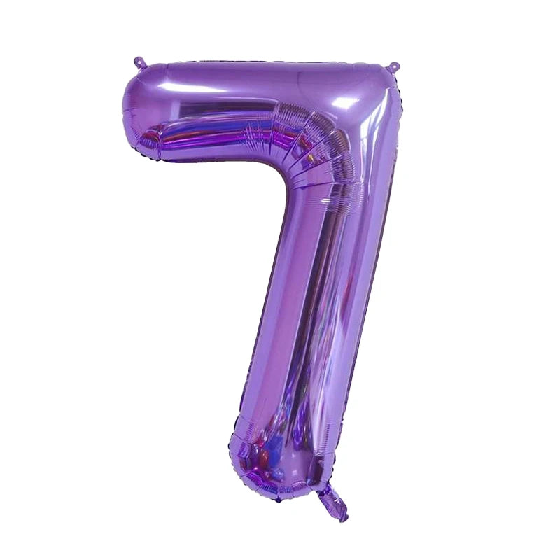 A purple foil number balloon shaped like the number 7.