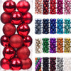 A collection of 24 festive Christmas baubles in various shades of red, gold, and purple glitter.