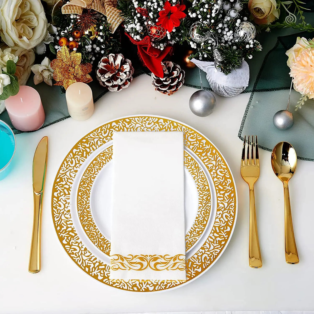 Elegant gold rim plastic dinner and dessert plate set with a white napkin and silverware