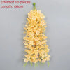 A long, yellow artificial wisteria flower garland measuring 60cm.