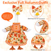 A full autumn outfit for a porch goose featuring a floral dress, matching bow hair accessory, and delicate lace.